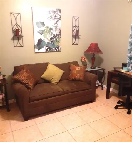 a living room with furniture and a couch