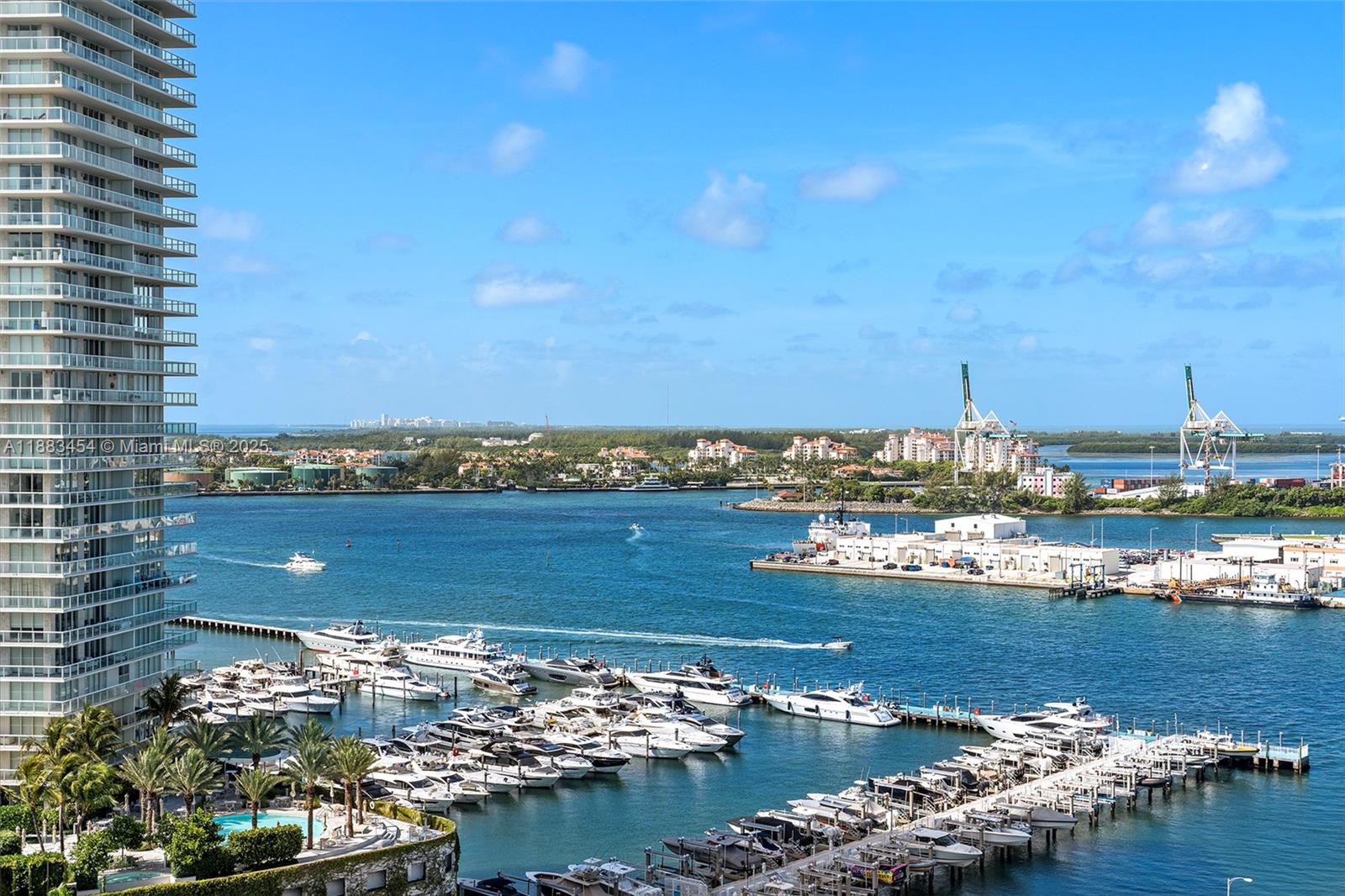 500 Alton Road, Unit 1904 Miami Beach, FL 33139 - Photo 20 of 31 a view of a lake with houses
