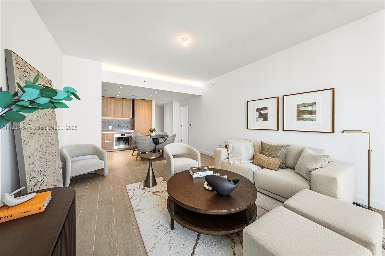 500 Alton Road, Unit 1904 Miami Beach, FL 33139 - Photo 5 of 31 a living room with furniture and a large window