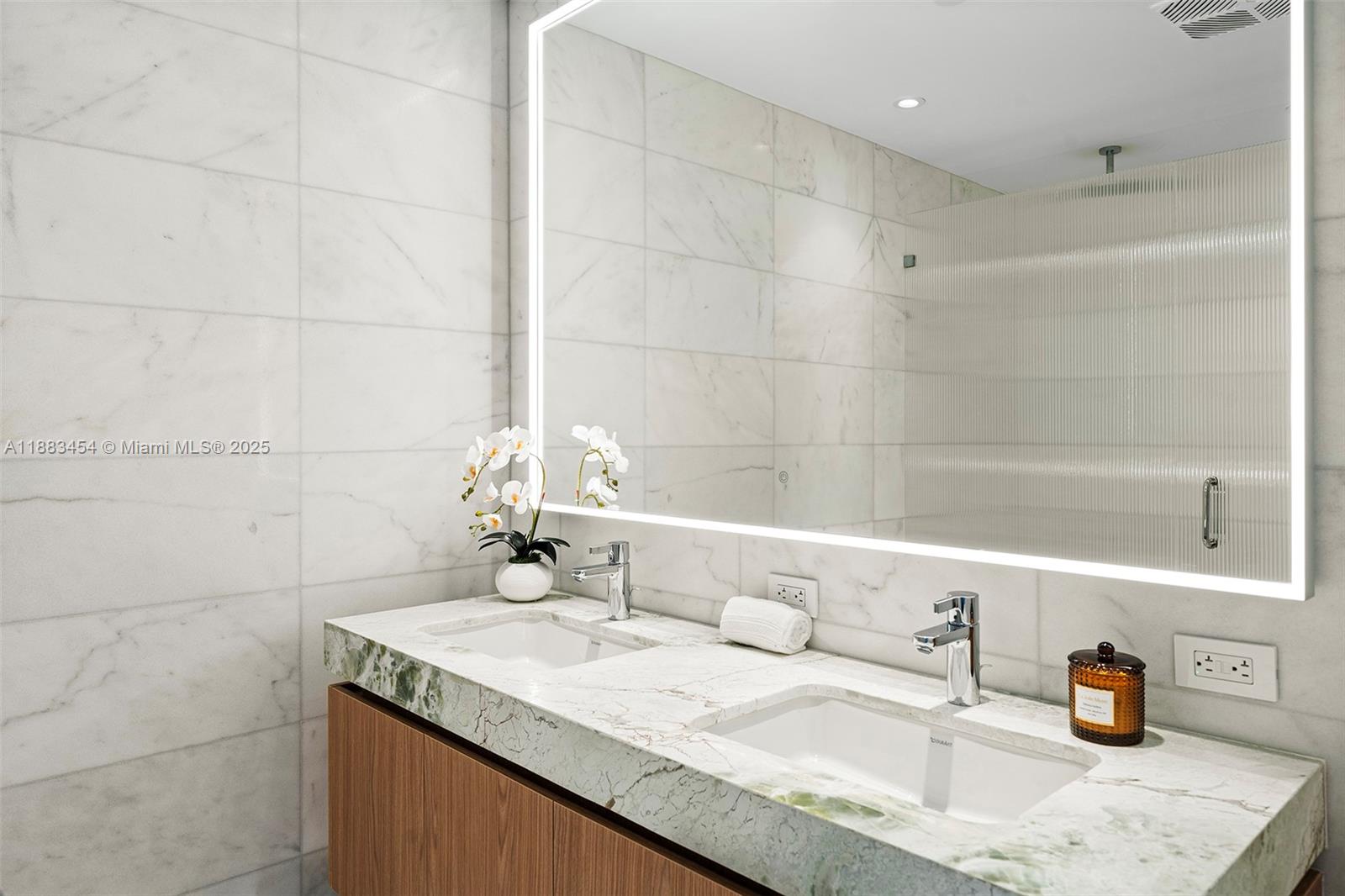 500 Alton Road, Unit 1904 Miami Beach, FL 33139 - Photo 8 of 31 a bathroom with a granite countertop sink and a mirror