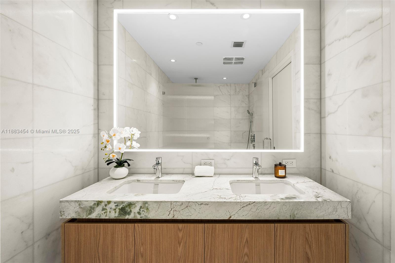 500 Alton Road, Unit 1904 Miami Beach, FL 33139 - Photo 10 of 31 a bathroom with a granite countertop sink and a mirror