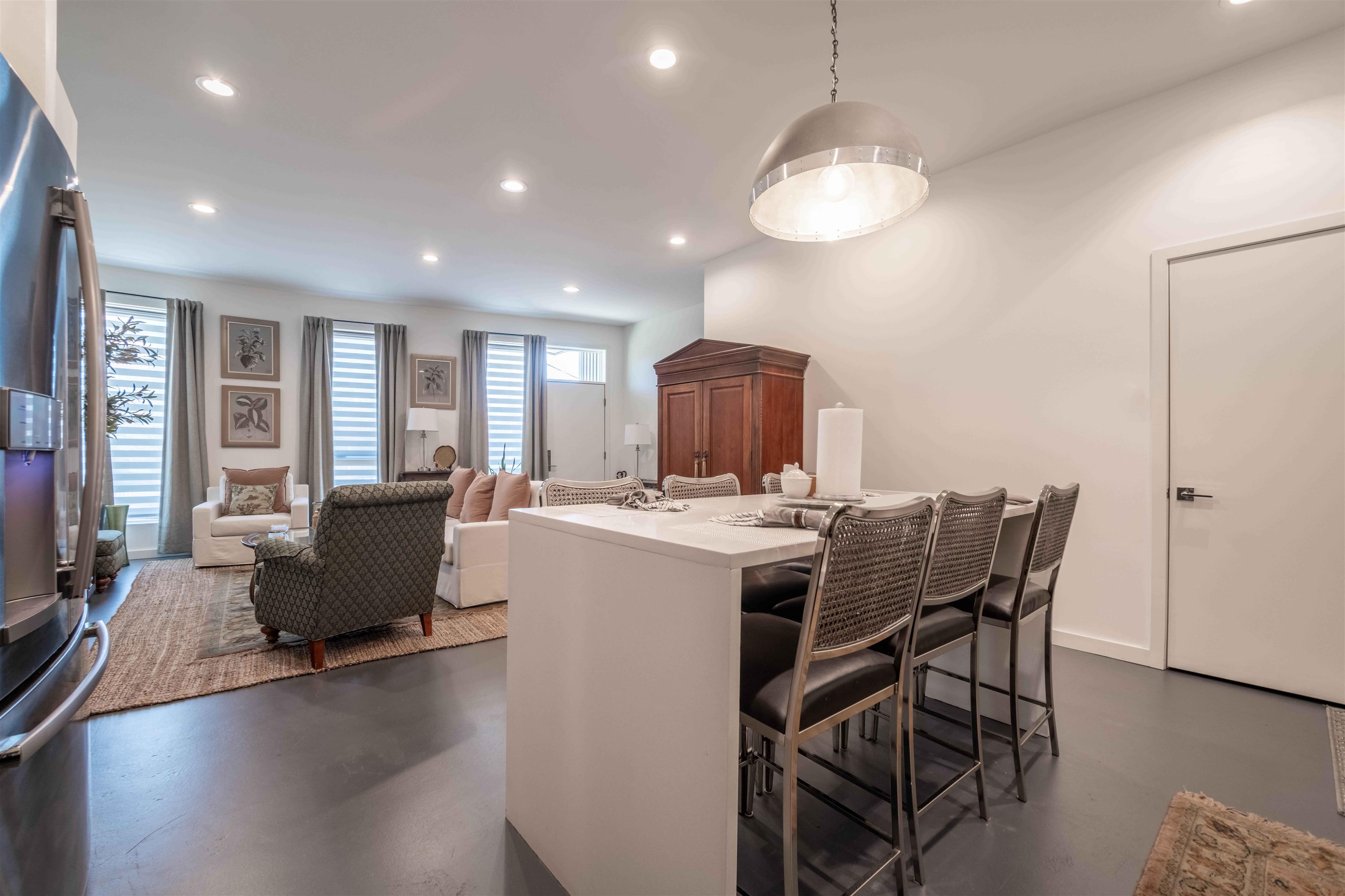 462 Frontline Cove Memphis, TN 38103 - Photo 14 of 38 a view of a dining room with furniture window and wooden floor