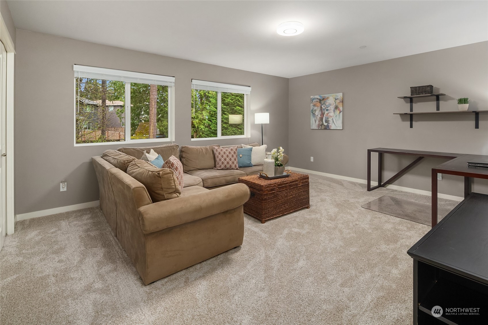 3215 217th Place Southeast Bothell, WA 98021 - Photo 23 of 30 a living room with furniture and a window