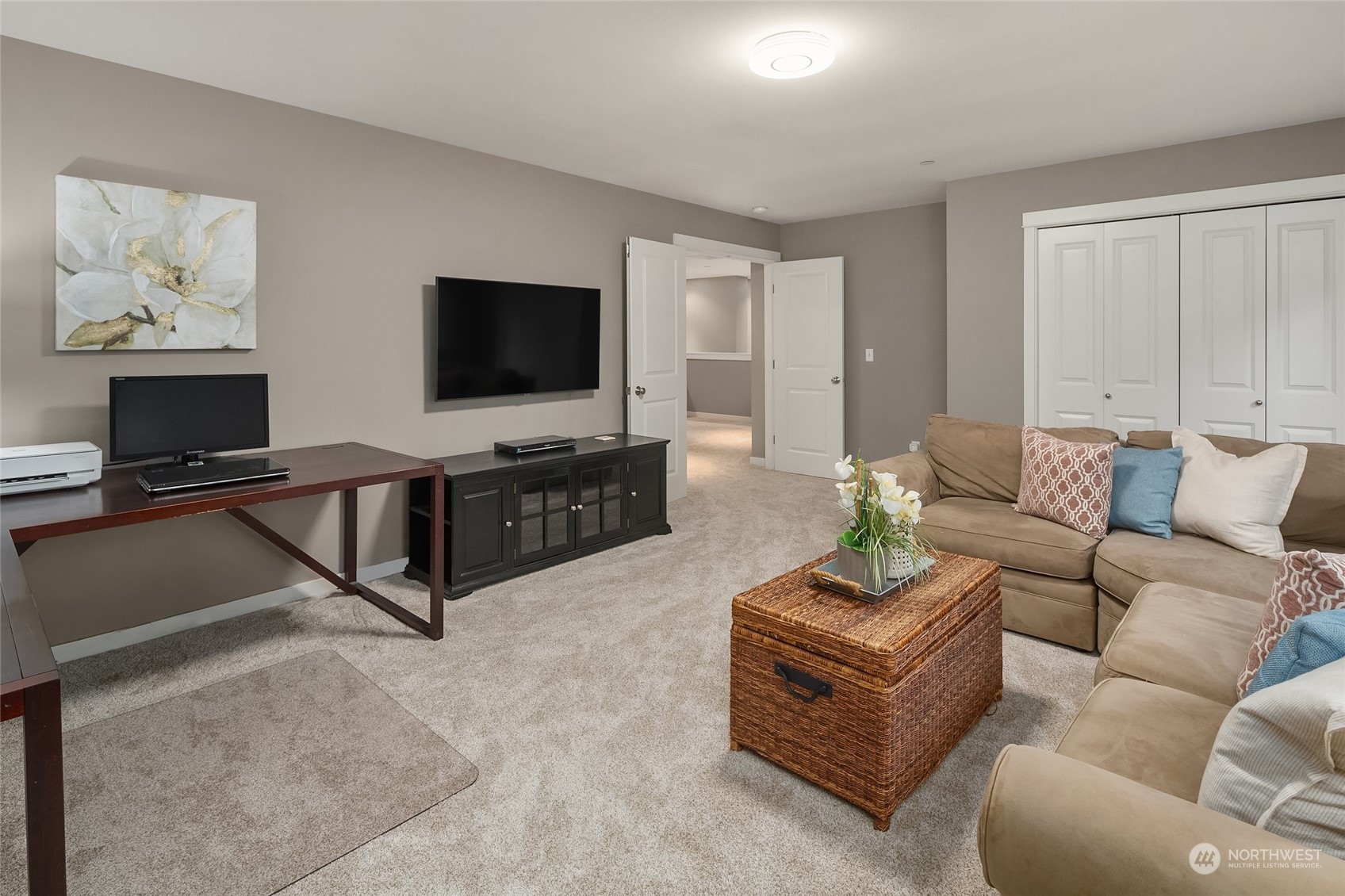 3215 217th Place Southeast Bothell, WA 98021 - Photo 24 of 30 a living room with furniture and a flat screen tv