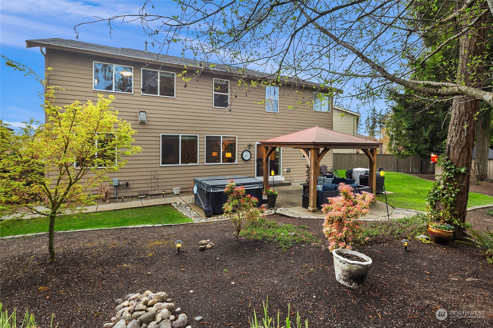 3215 217th Place Southeast Bothell, WA 98021 - Photo 30 of 30 a front view of a house with garden