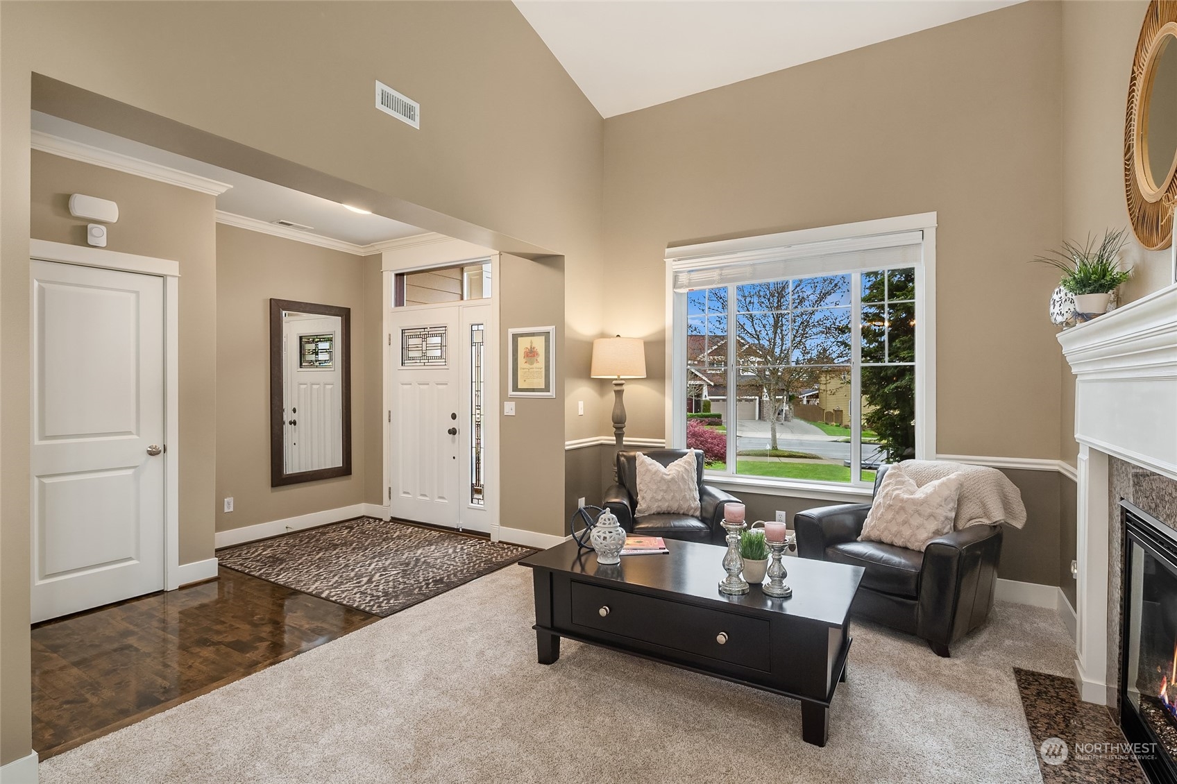 3215 217th Place Southeast Bothell, WA 98021 - Photo 3 of 30 a living room with furniture and a floor to ceiling window