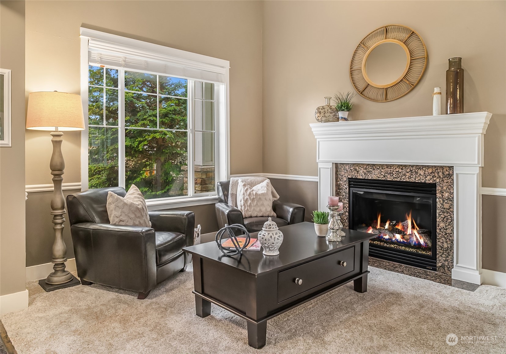 3215 217th Place Southeast Bothell, WA 98021 - Photo 4 of 30 a living room with furniture and a fireplace