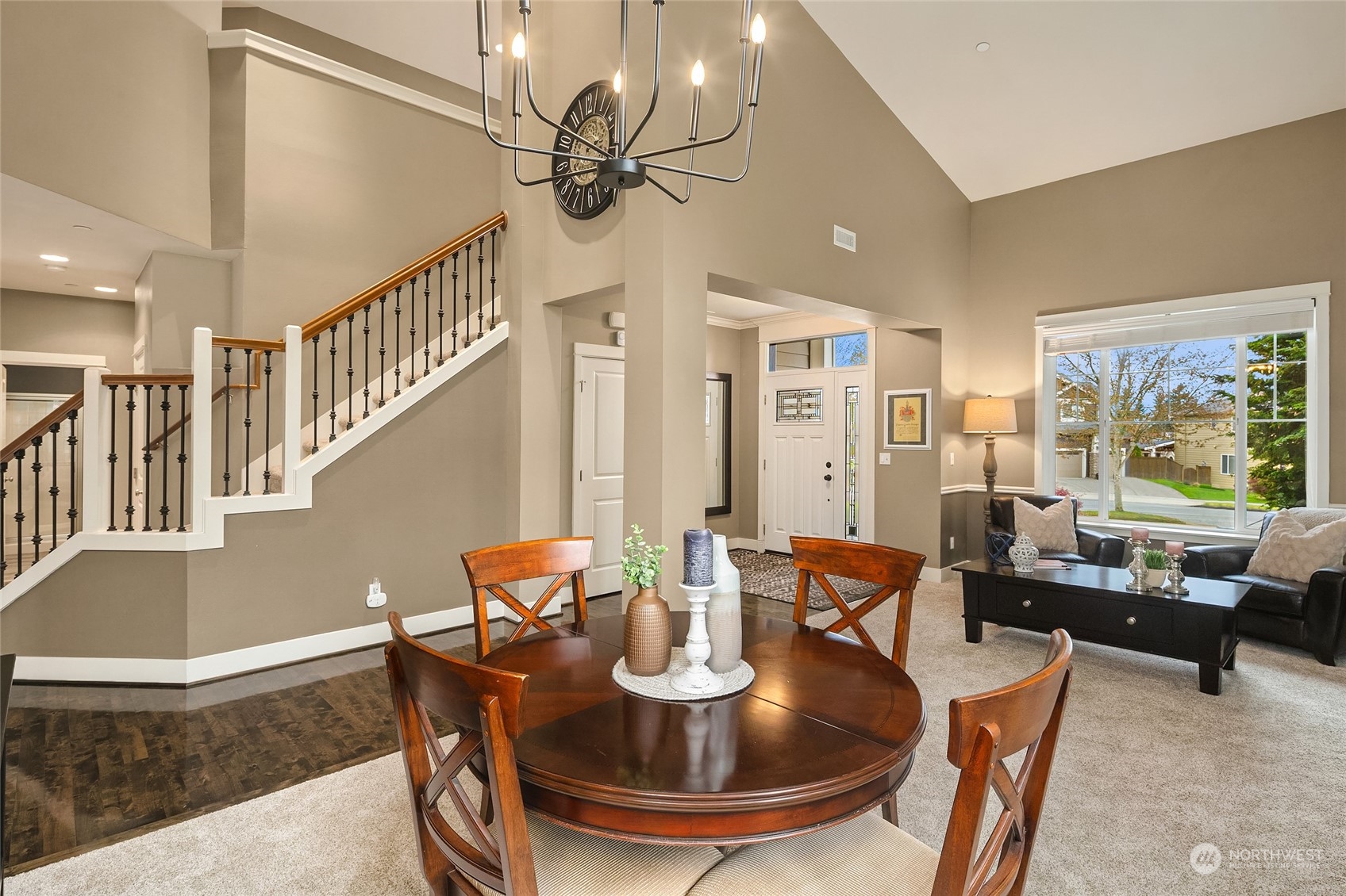 3215 217th Place Southeast Bothell, WA 98021 - Photo 7 of 30 a dining room with furniture a rug and wooden floor