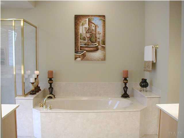 2575 Pine Forest Road Cantonment, FL 32533 - Photo 16 of 24 Master bathroom has cultured marble whirlpool tub for soaking