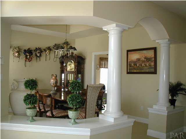 2575 Pine Forest Road Cantonment, FL 32533 - Photo 3 of 24 This is a view to your left upon entry. Gorgeous architectural features to outline the formal dining area.