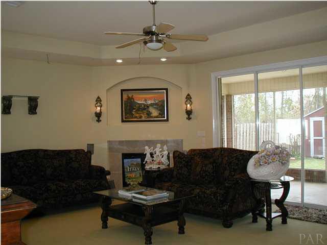 2575 Pine Forest Road Cantonment, FL 32533 - Photo 6 of 24 Great Room with trey ceiling, more architectural arches and gas fireplace