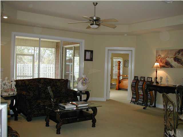 2575 Pine Forest Road Cantonment, FL 32533 - Photo 7 of 24 Slider door stacks for expansion of your entertaining/living area.