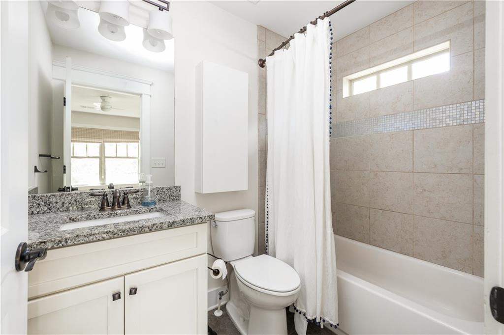 1333 Oakview Road Decatur, GA 30030 - Photo 17 of 28 a bathroom with a sink toilet and shower