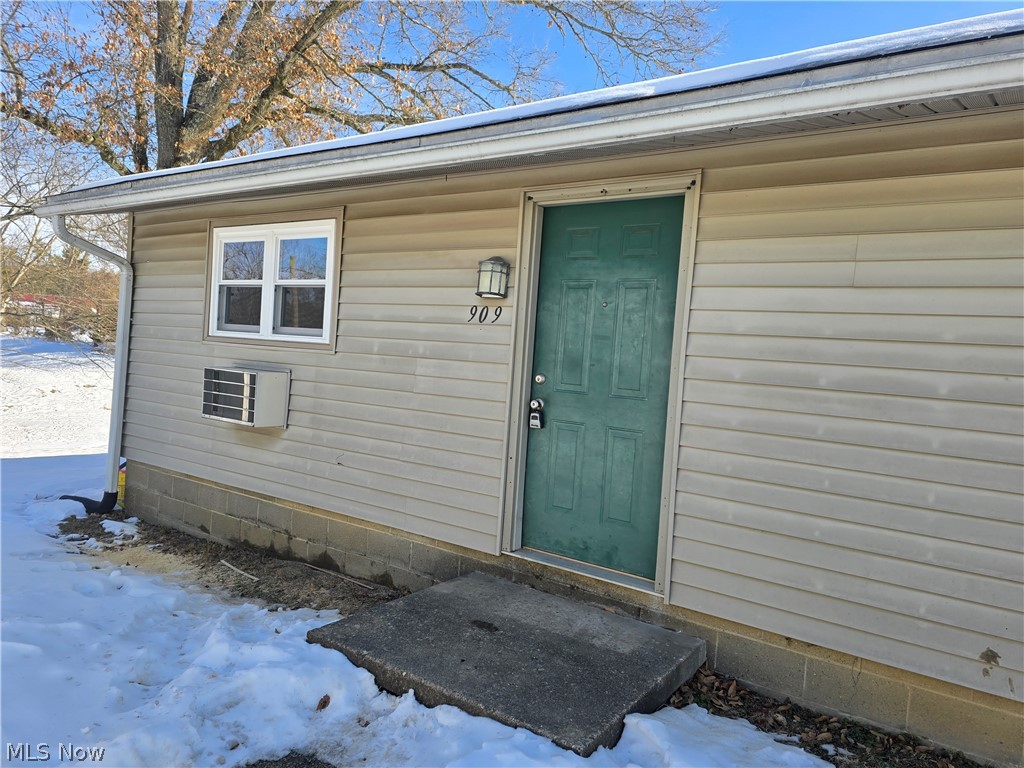 909 Garden Road Zanesville, OH 43701 - Photo 1 of 8 View of snow covered property entrance