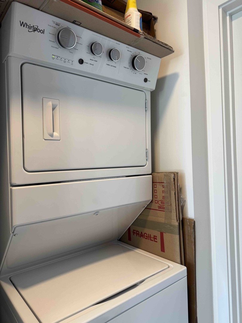 Undisclosed Address Chicago, IL 60607 - Photo 16 of 28 a utility room with dryer and washer