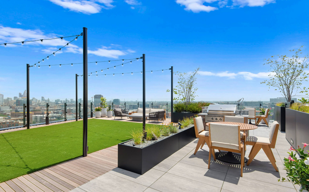 Undisclosed Address Chicago, IL 60607 - Photo 25 of 28 a view of a patio with a table chairs and a fire pit