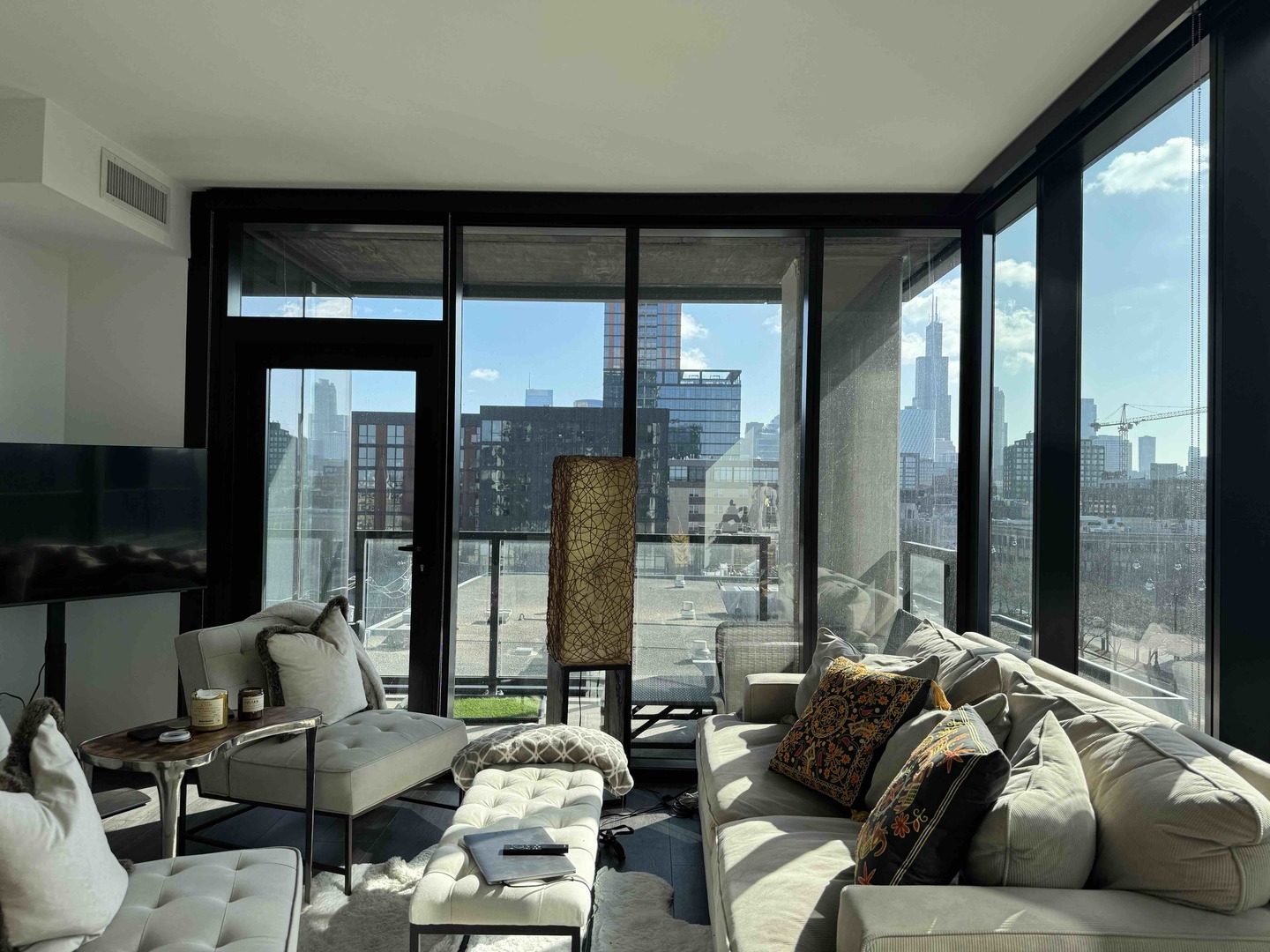 Undisclosed Address Chicago, IL 60607 - Photo 5 of 28 a living room with furniture and a large window