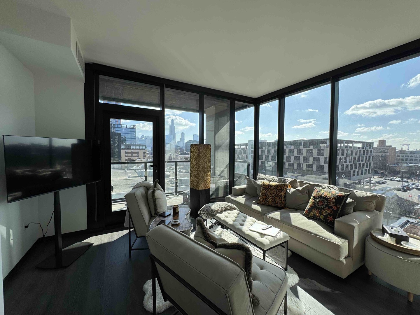 Undisclosed Address Chicago, IL 60607 - Photo 6 of 28 a living room with furniture and a floor to ceiling window