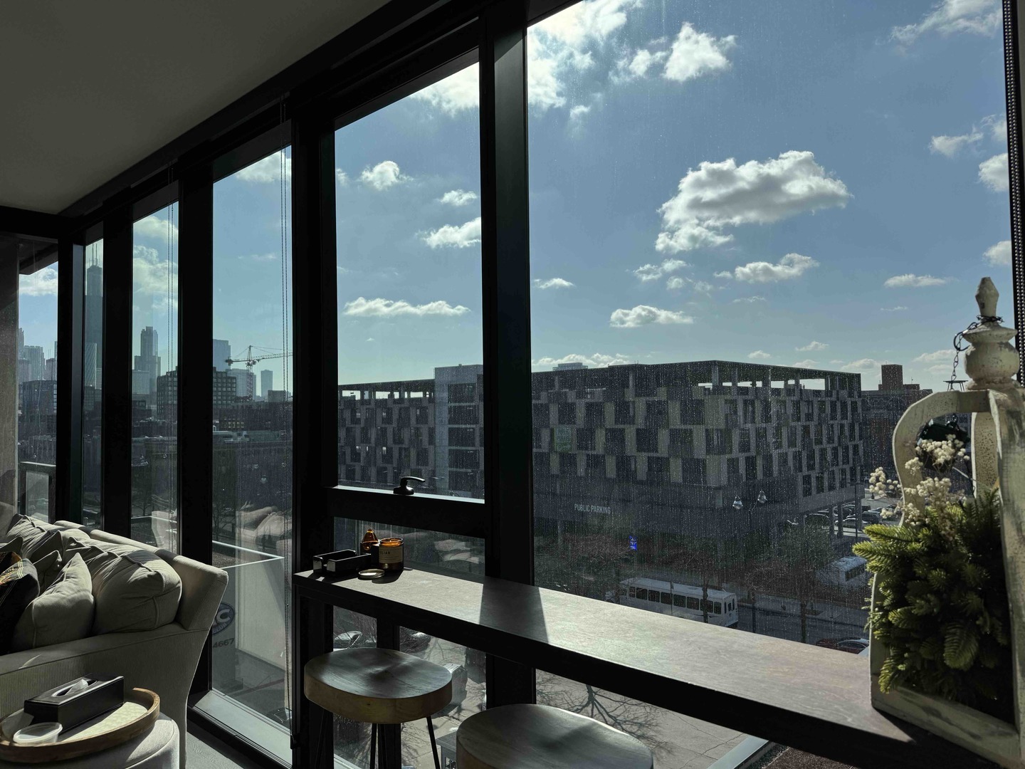 Undisclosed Address Chicago, IL 60607 - Photo 7 of 28 a room with furniture and a floor to ceiling window