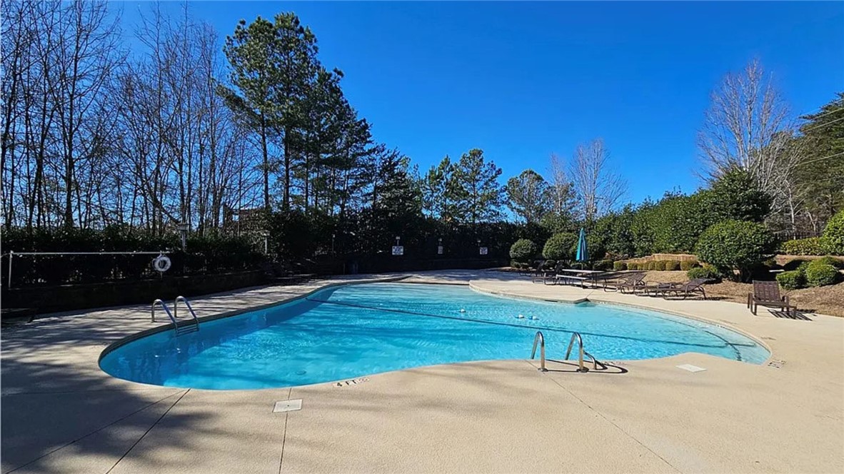 303 Lookover Drive Anderson, SC 29621 - Photo 44 of 46 This tranquil outdoor oasis features a sparkling pool, perfect for relaxation and recreation.