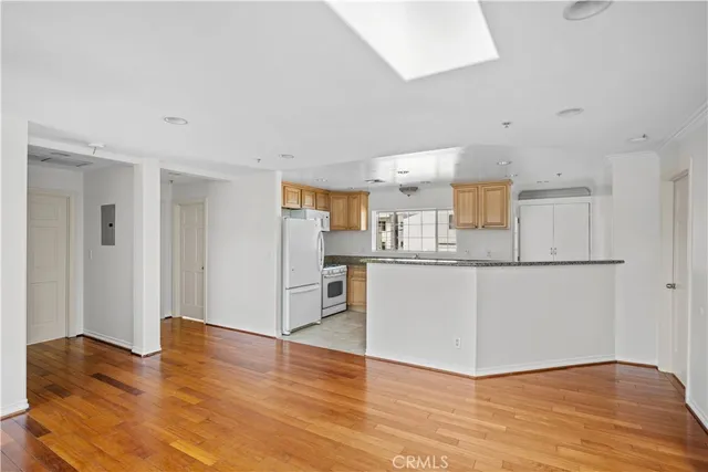 a view of kitchen with wooden floor