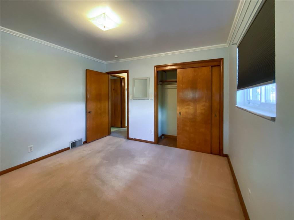 128 Clover Drive Monaca, PA 15061 - Photo 11 of 19 an empty room with windows