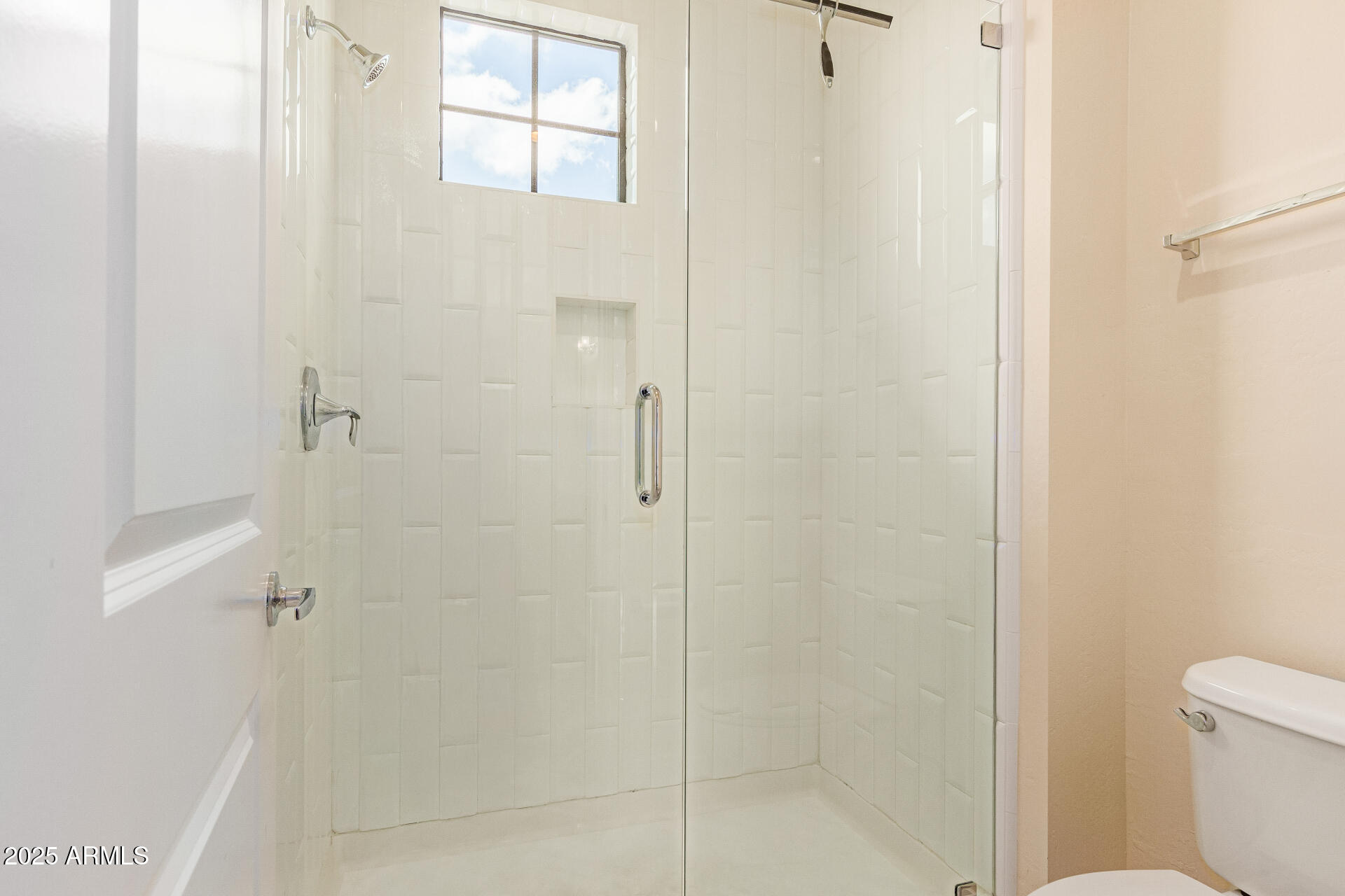 2315 North 52nd Street, Unit 144 Phoenix, AZ 85008 - Photo 15 of 28 a bathroom with a shower and toilet