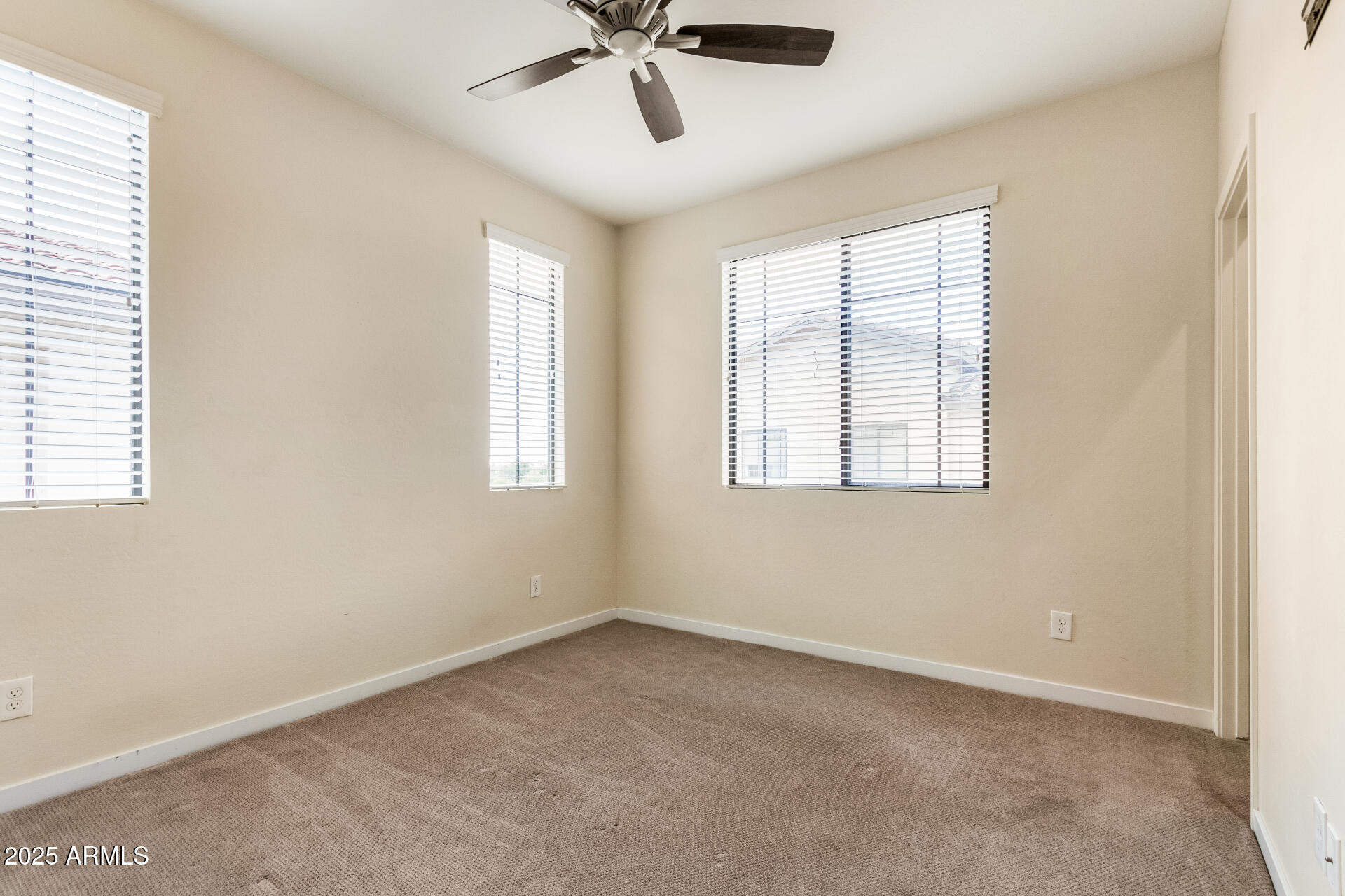 2315 North 52nd Street, Unit 144 Phoenix, AZ 85008 - Photo 16 of 28 a view of an empty room with a window