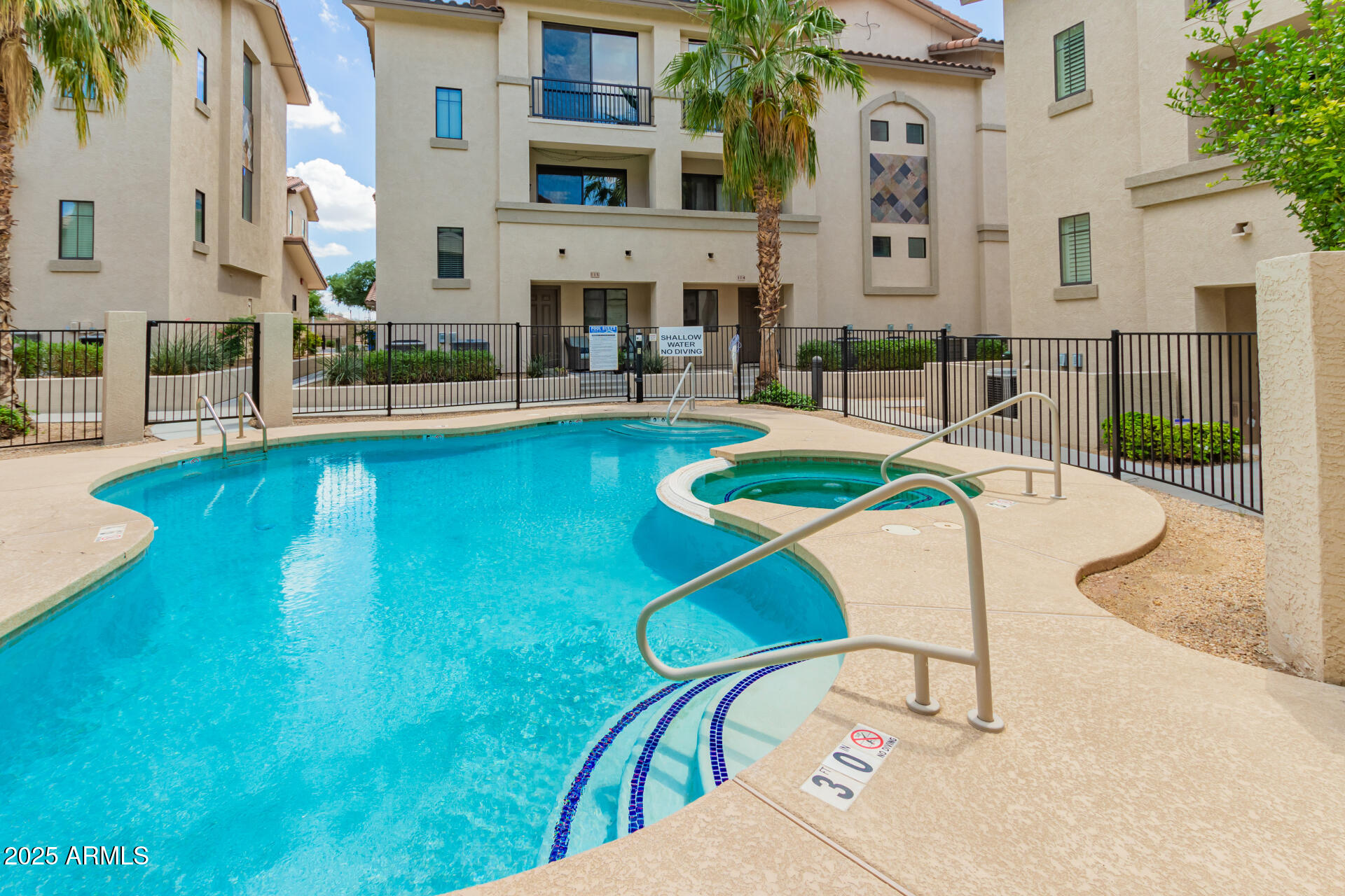 2315 North 52nd Street, Unit 144 Phoenix, AZ 85008 - Photo 20 of 28 a view of a swimming pool with a patio