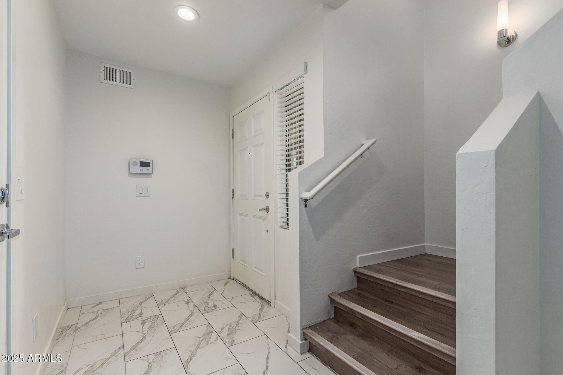 2315 North 52nd Street, Unit 144 Phoenix, AZ 85008 - Photo 22 of 28 a view of an entryway with staircase