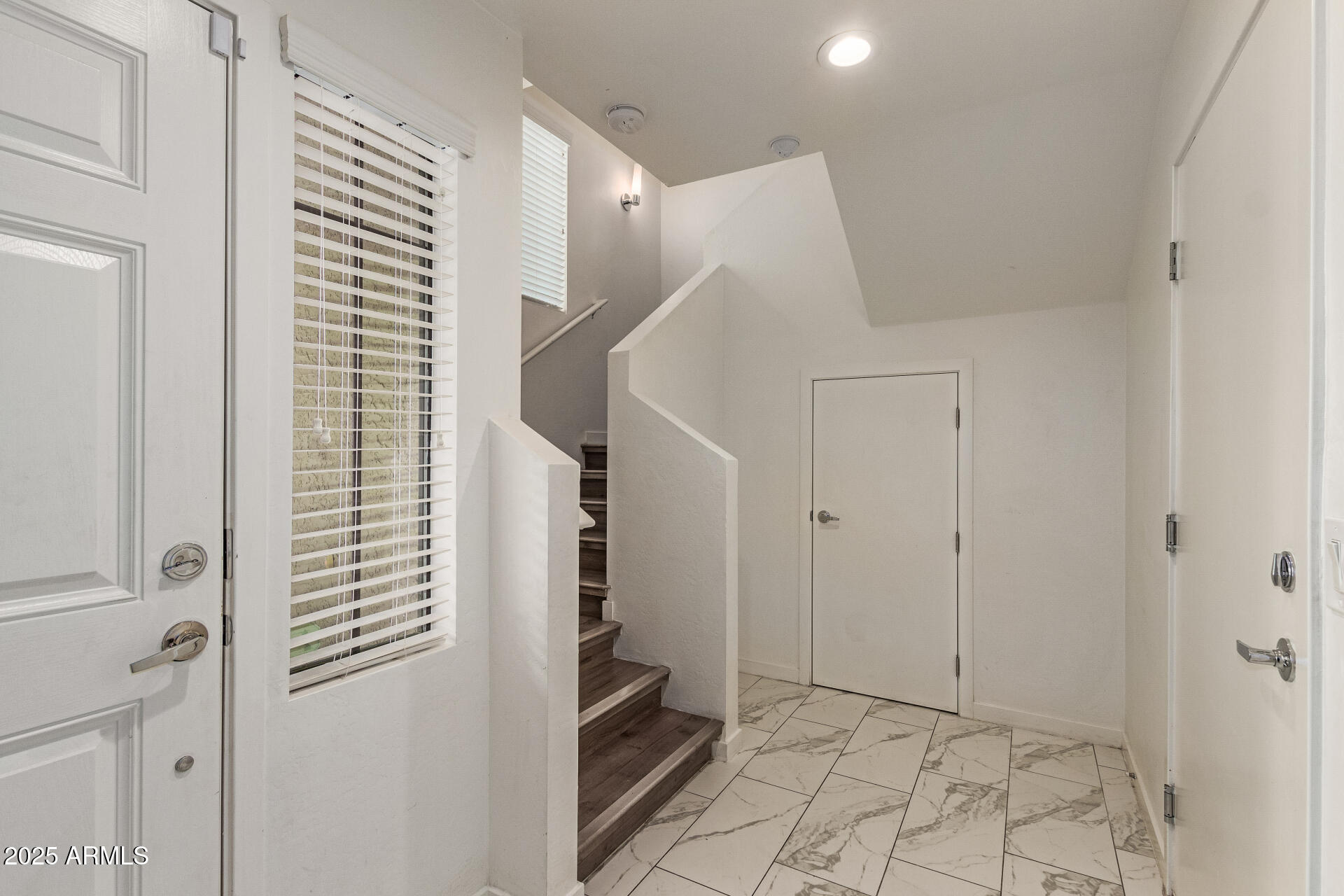 2315 North 52nd Street, Unit 144 Phoenix, AZ 85008 - Photo 23 of 28 a view of entryway with white walls and tiles