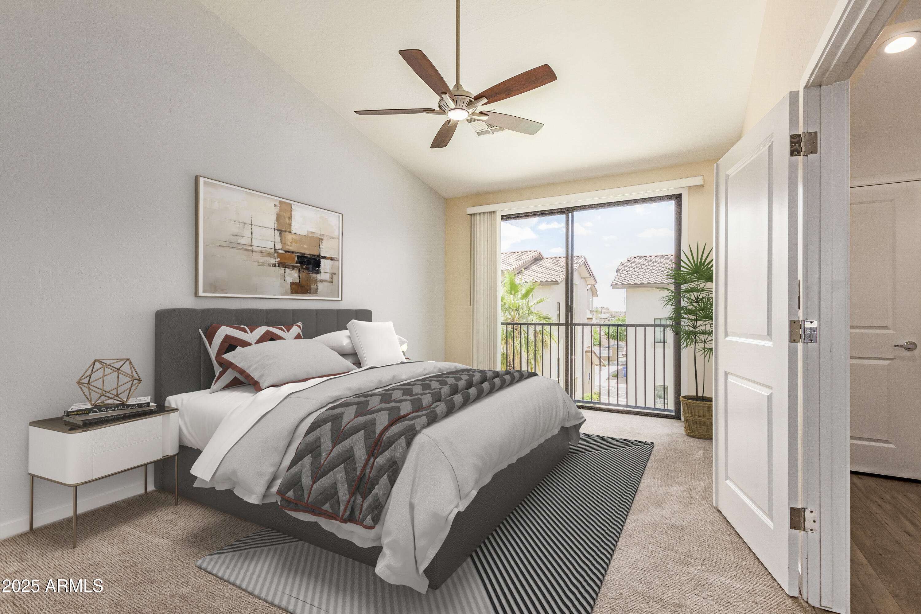 2315 North 52nd Street, Unit 144 Phoenix, AZ 85008 - Photo 10 of 28 a bedroom with a balcony a bed and a large window