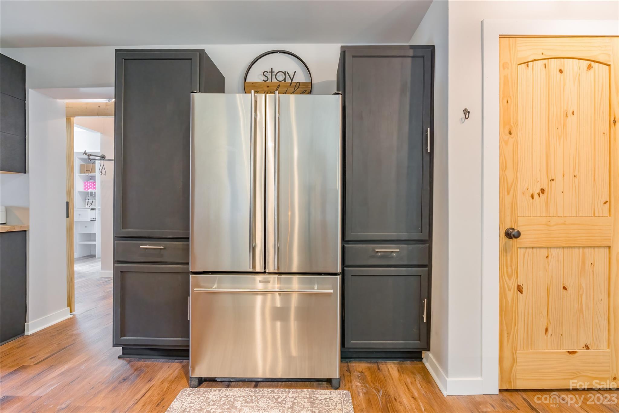 177 State Rd S-29-70 Lancaster, SC 29720 - Photo 12 of 30 a view of kitchen with wooden floor electronic appliances and windows