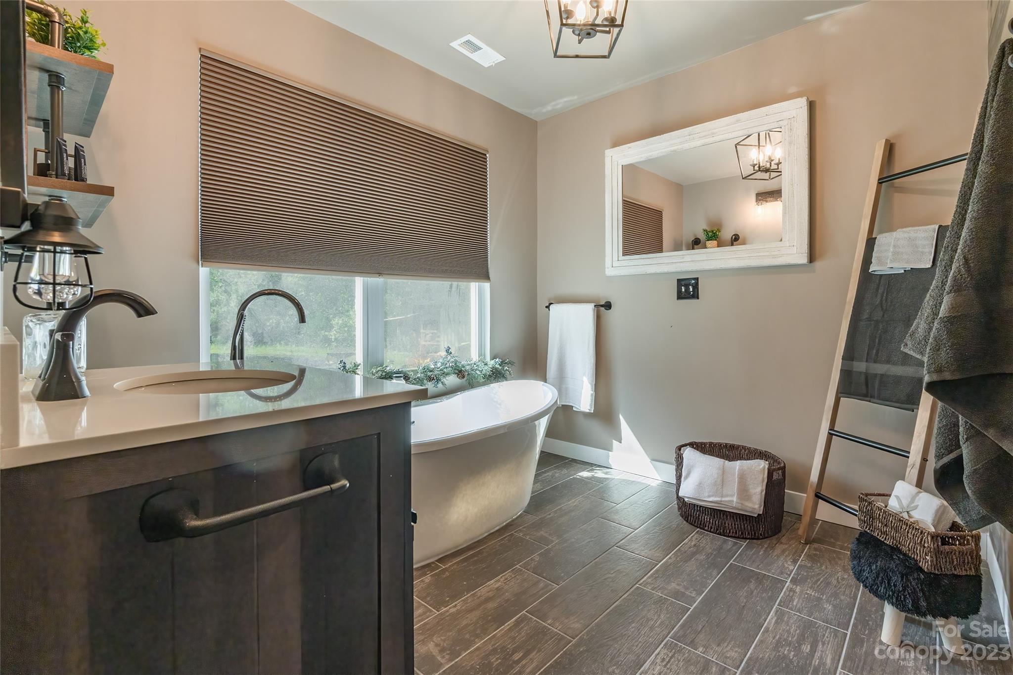 177 State Rd S-29-70 Lancaster, SC 29720 - Photo 21 of 30 a bathroom with a granite countertop sink mirror vanity and toilet