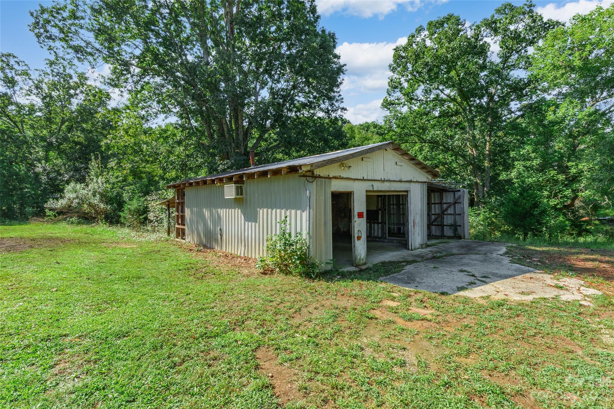 177 State Rd S-29-70 Lancaster, SC 29720 - Photo 27 of 30 a view of a house with yard and garden
