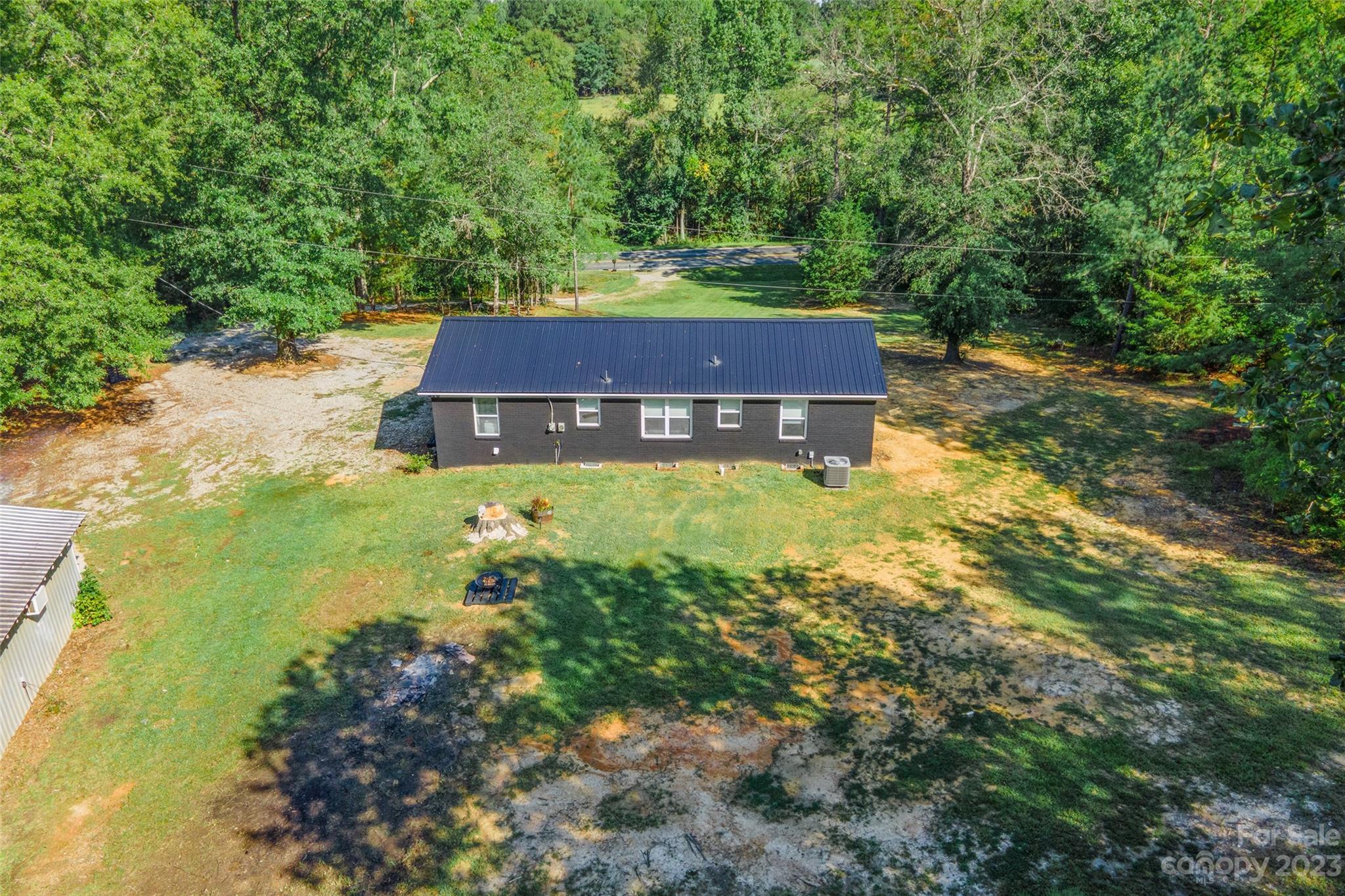 177 State Rd S-29-70 Lancaster, SC 29720 - Photo 28 of 30 a aerial view of a house with swimming pool