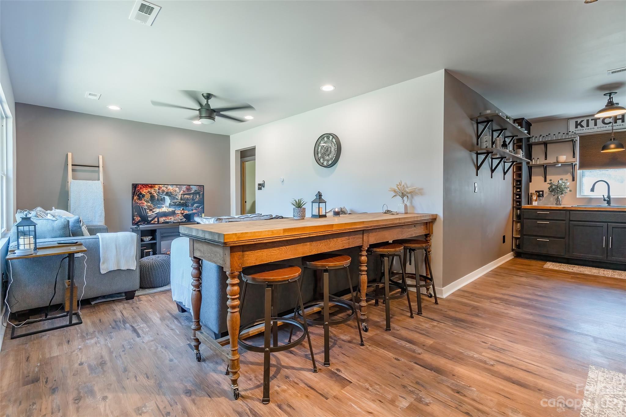 177 State Rd S-29-70 Lancaster, SC 29720 - Photo 5 of 30 a view of a dining room with furniture and wooden floor