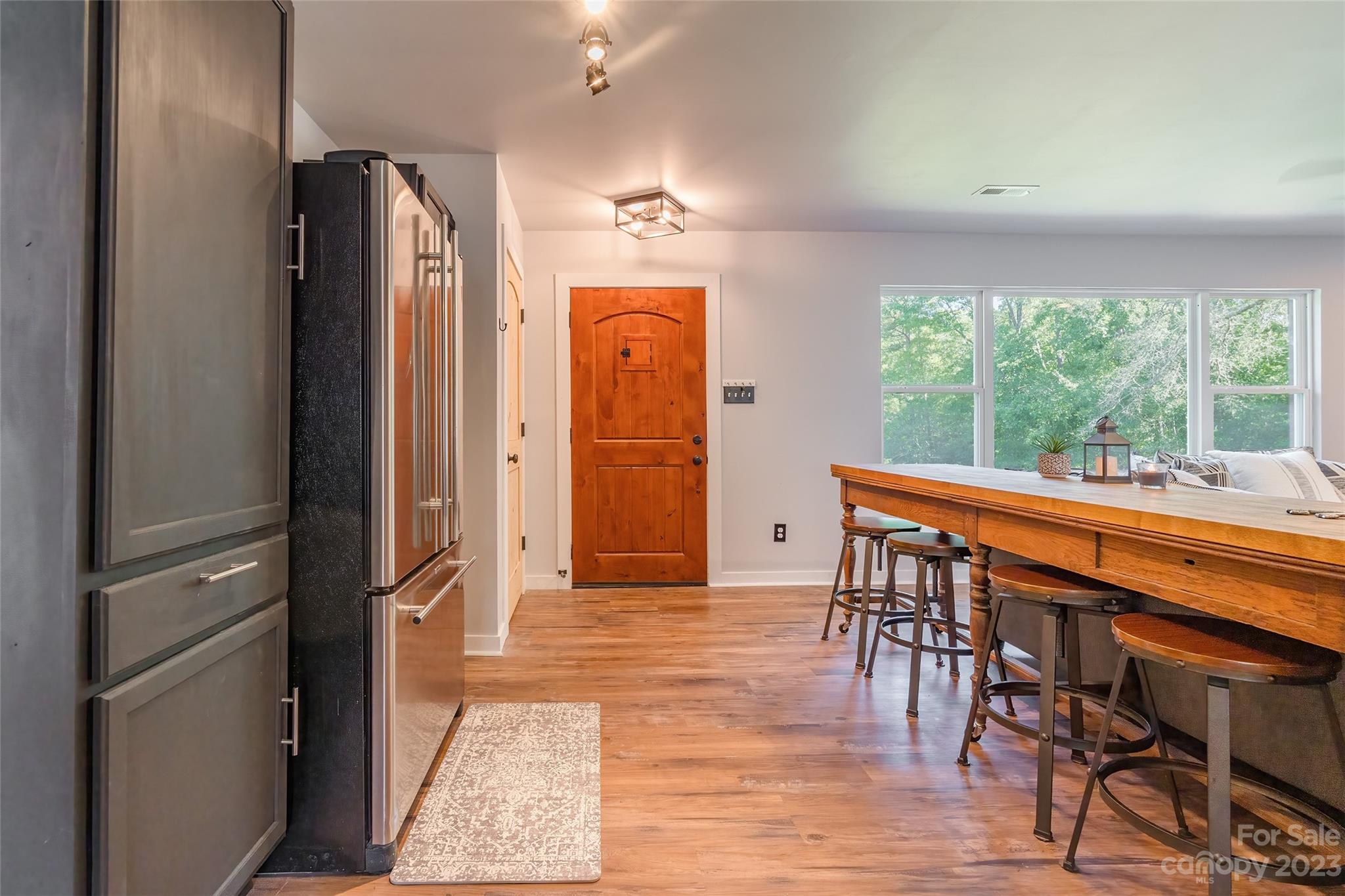177 State Rd S-29-70 Lancaster, SC 29720 - Photo 7 of 30 a dining room with stainless steel appliances granite countertop furniture and a window