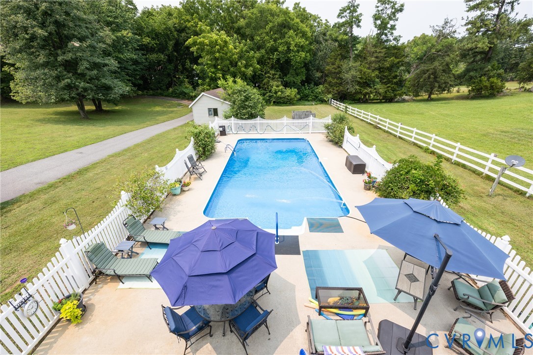 768 Hardtimes Road Farmville, VA 23901 - Photo 8 of 56 In-ground vinyl swimming pool with surrounding pat