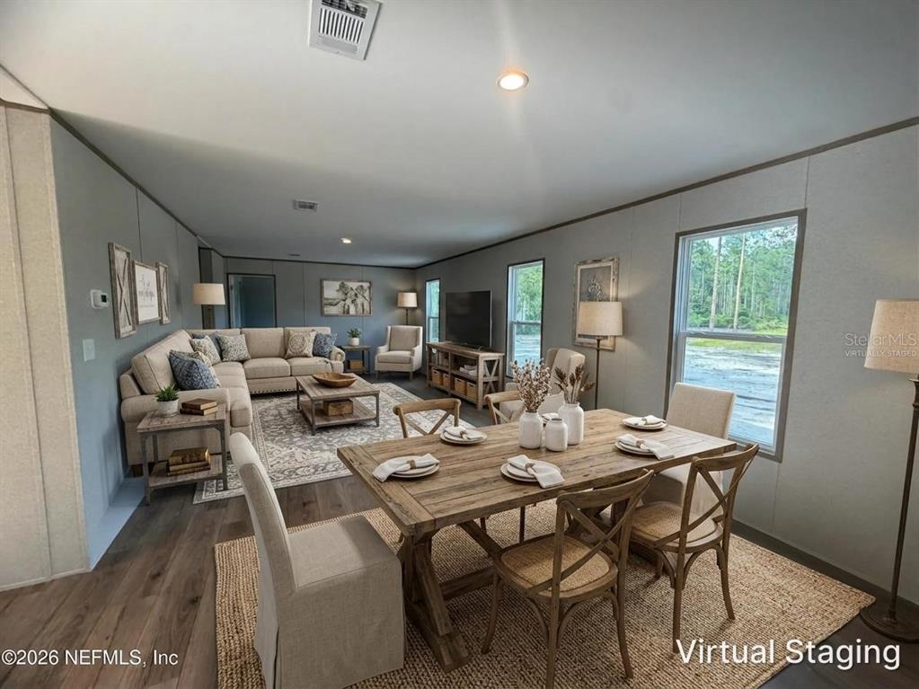 114 Nutmeg Trail Interlachen, FL 32148 - Photo 27 of 33 a view of a dining room with furniture