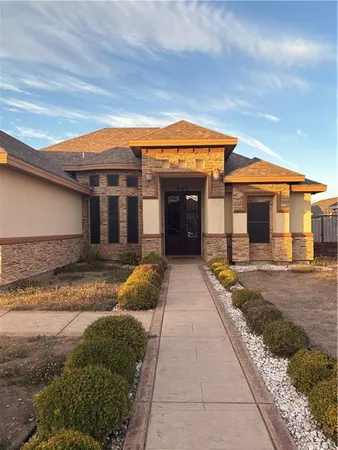 a front view of house with yard