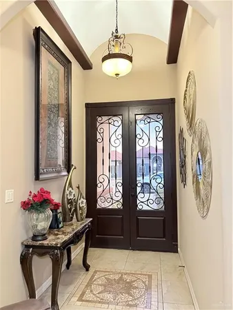 a view of a entryway with furniture and a window