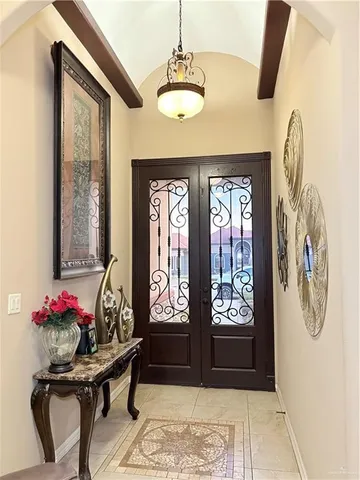 a view of a entryway with furniture and a window