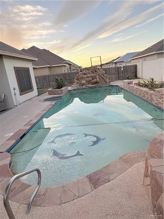 a house view with a backyard space