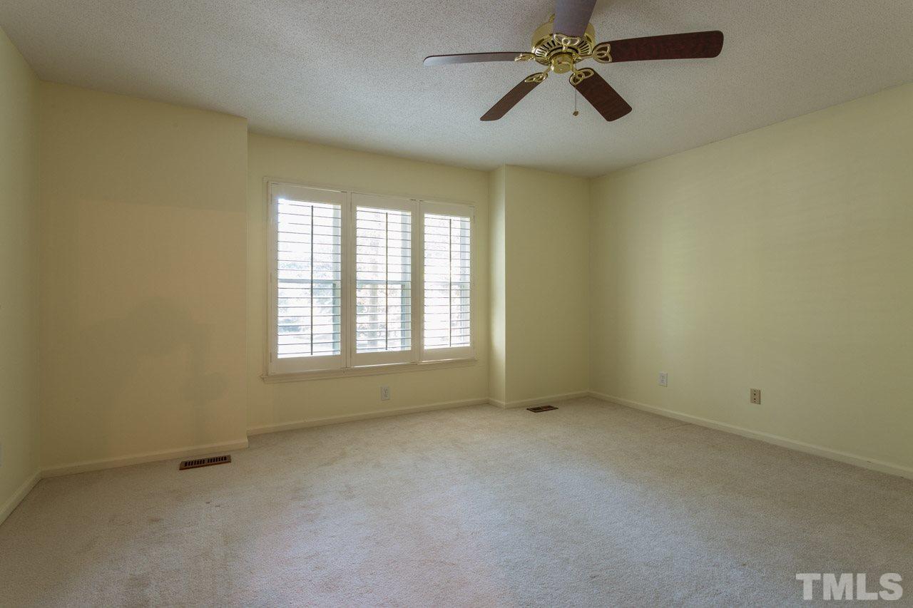 10205 Bushveld Lane Raleigh, NC 27613 - Photo 16 of 22 Large bedroom at front of home