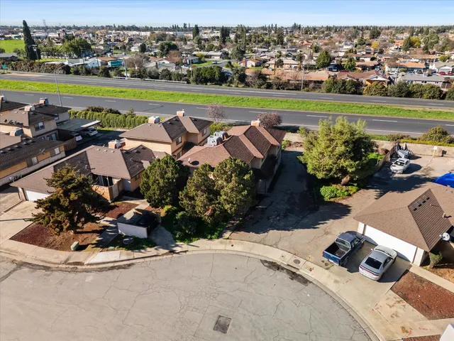 an aerial view of a house with a garden