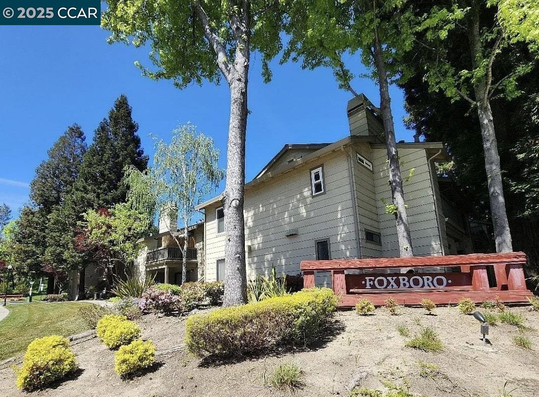 405 Weymouth Hercules, CA 94547 - Photo 1 of 21 a view of a street with a building in the background
