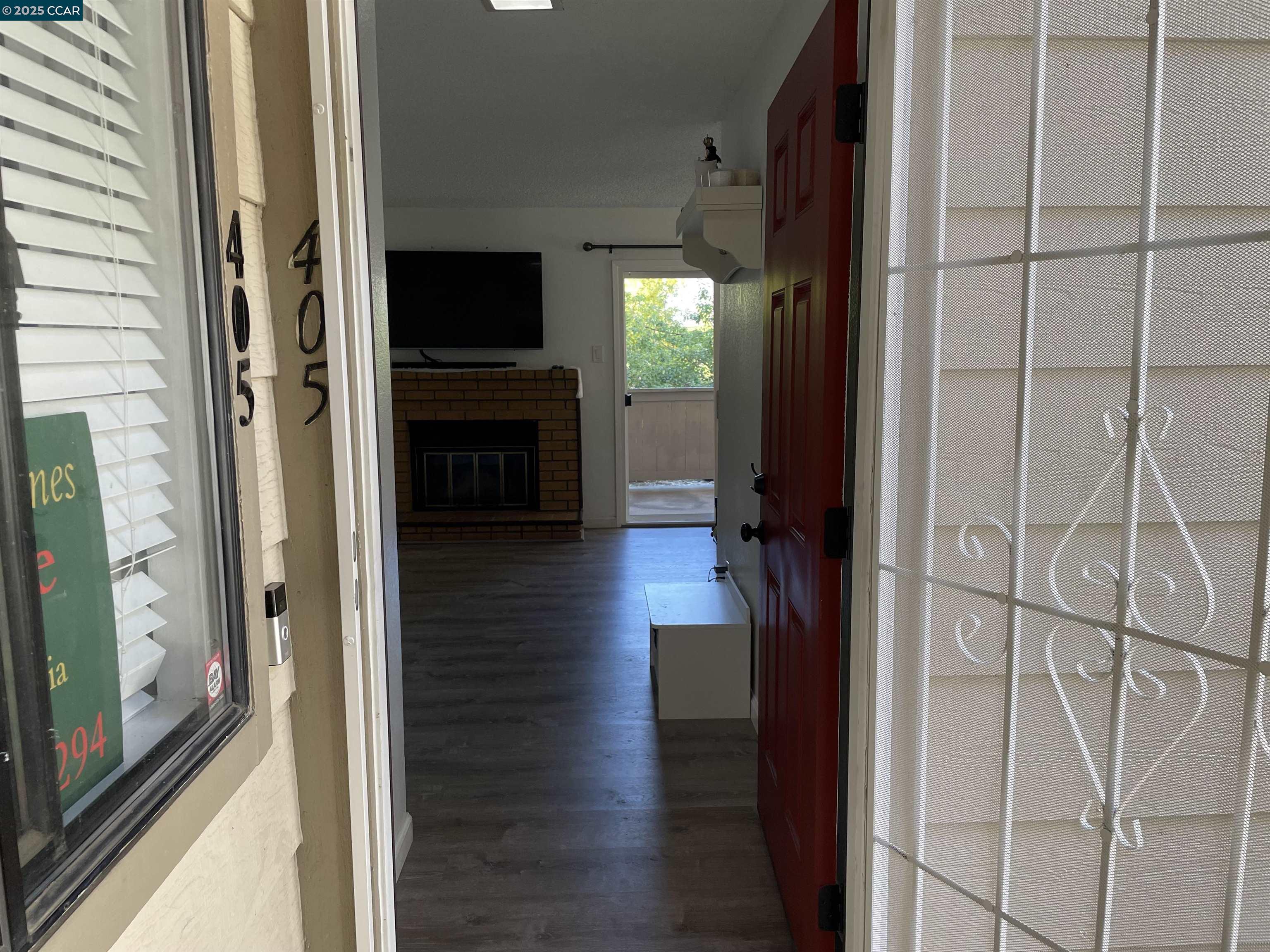 405 Weymouth Hercules, CA 94547 - Photo 3 of 21 a view of a hallway view with wooden floor and staircase