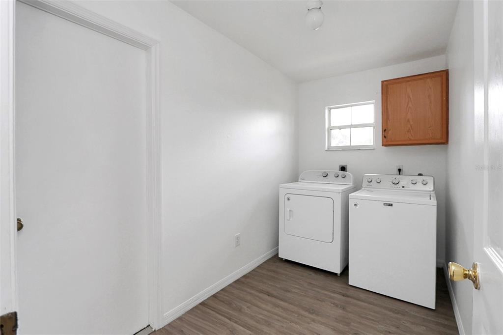 10648 Southwest 38th Avenue Ocala, FL 34476 - Photo 15 of 52 a view of utility room with washer and dryer