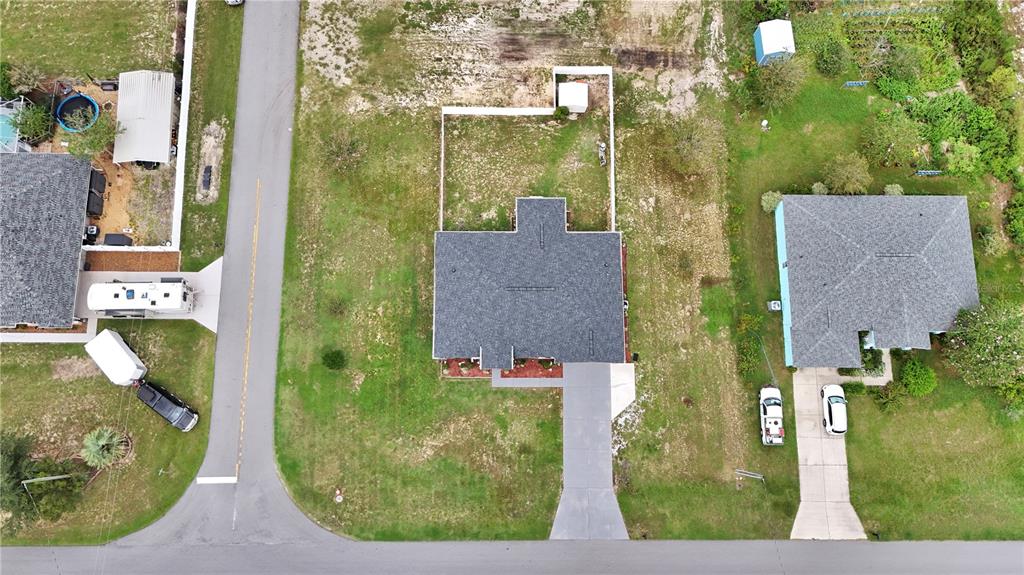 10648 Southwest 38th Avenue Ocala, FL 34476 - Photo 43 of 52 an aerial view of a house with garden